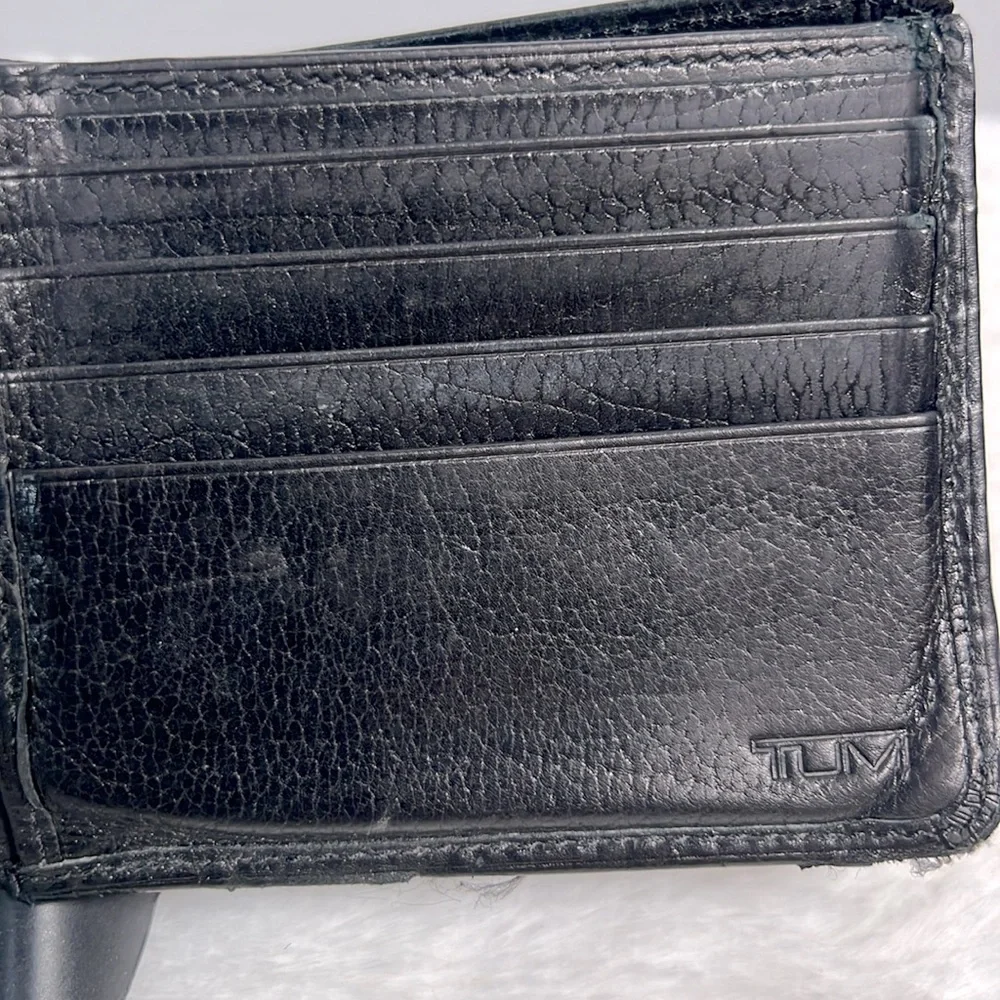 Tumi black leather